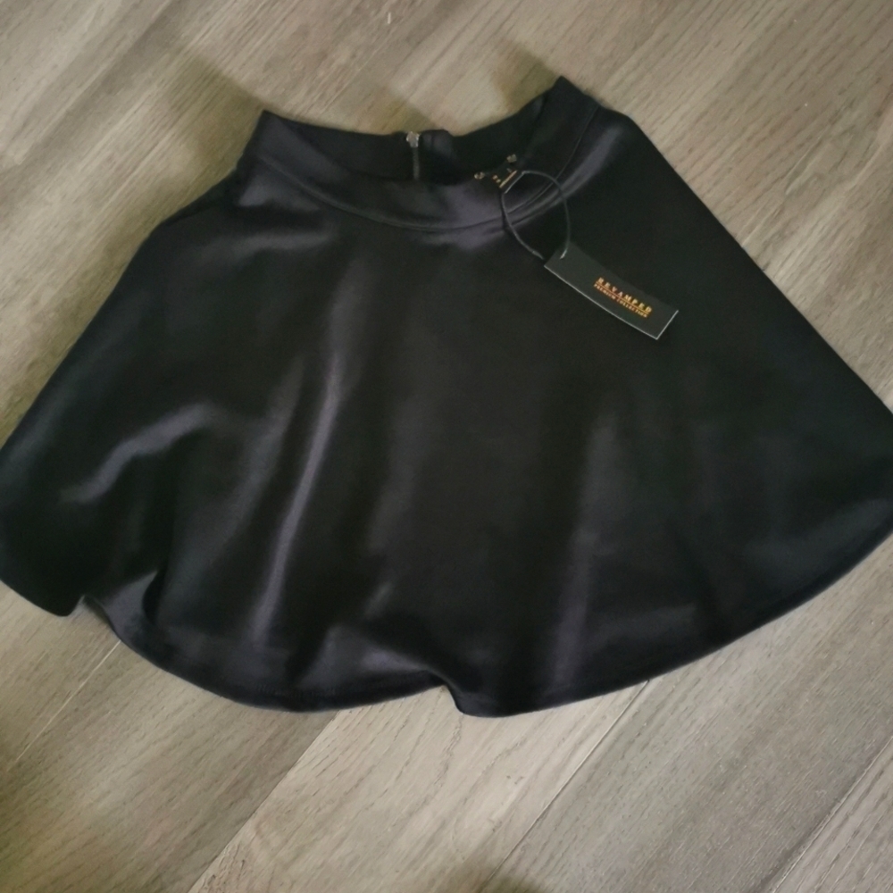 Revamped A line flare black mini  skater skirt. NWT. Size small